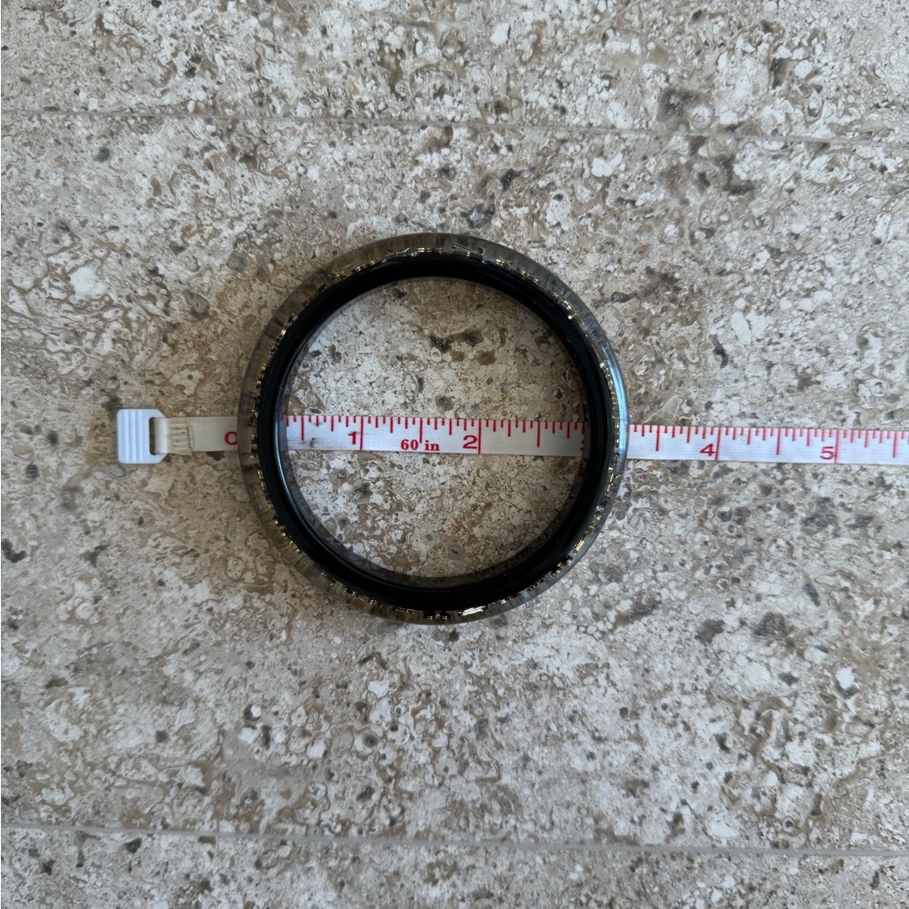 LOUIS VUITTON AUTHENTIC RESIN FULL - inclusion bracelet. Ring sold separately